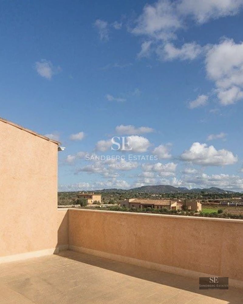 Exterior view of a modern villa with infinity pool, spacious terraces, and lush greenery. Contemporary design with high-end finishes.