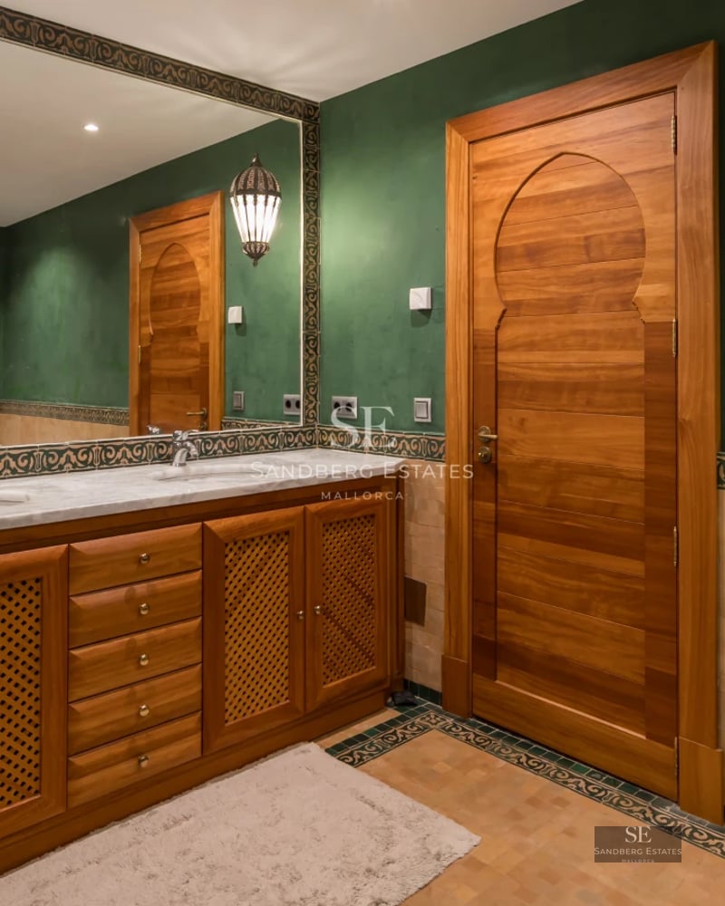 Exterior view of modern villa with infinity pool. Minimalist architecture, large glass windows, and manicured landscaping.