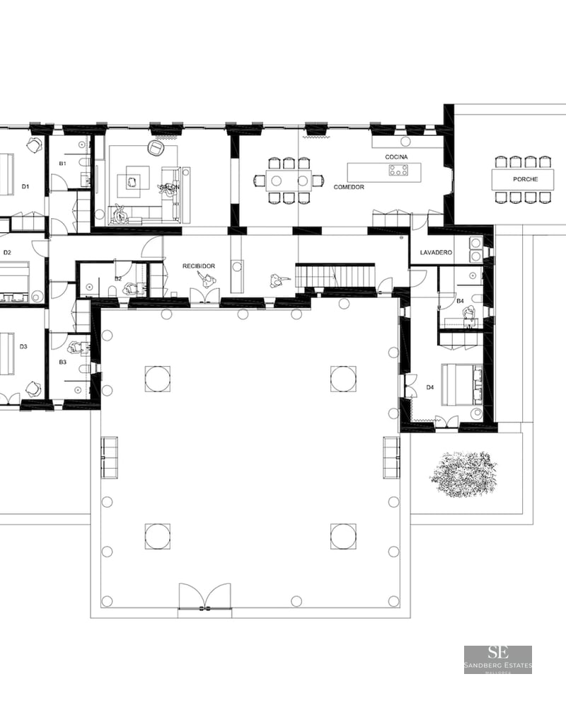 View of an infinity pool with a glass edge, sun loungers, and umbrellas. Modern design with high-quality finishes and landscaped garden.
