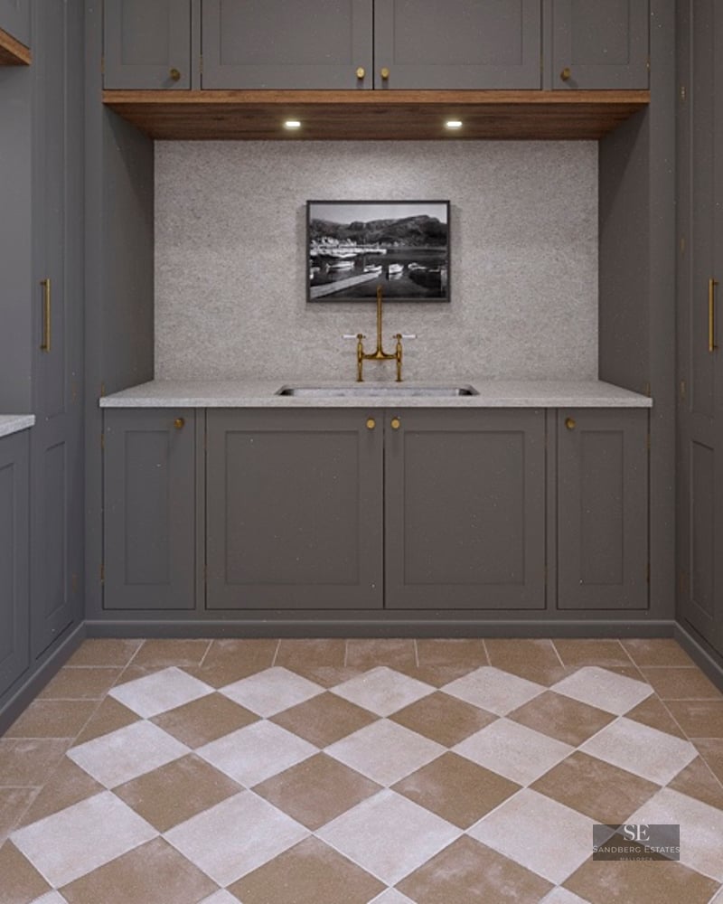 Utility room featuring dark gray cabinets, brass fixtures, and a checkerboard tile floor.