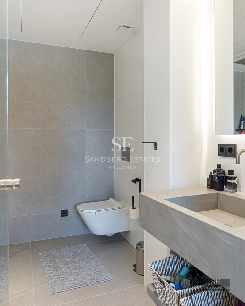 Exterior of modern villa with pool, large windows, and lush garden. Minimalist and elegant architectural design.