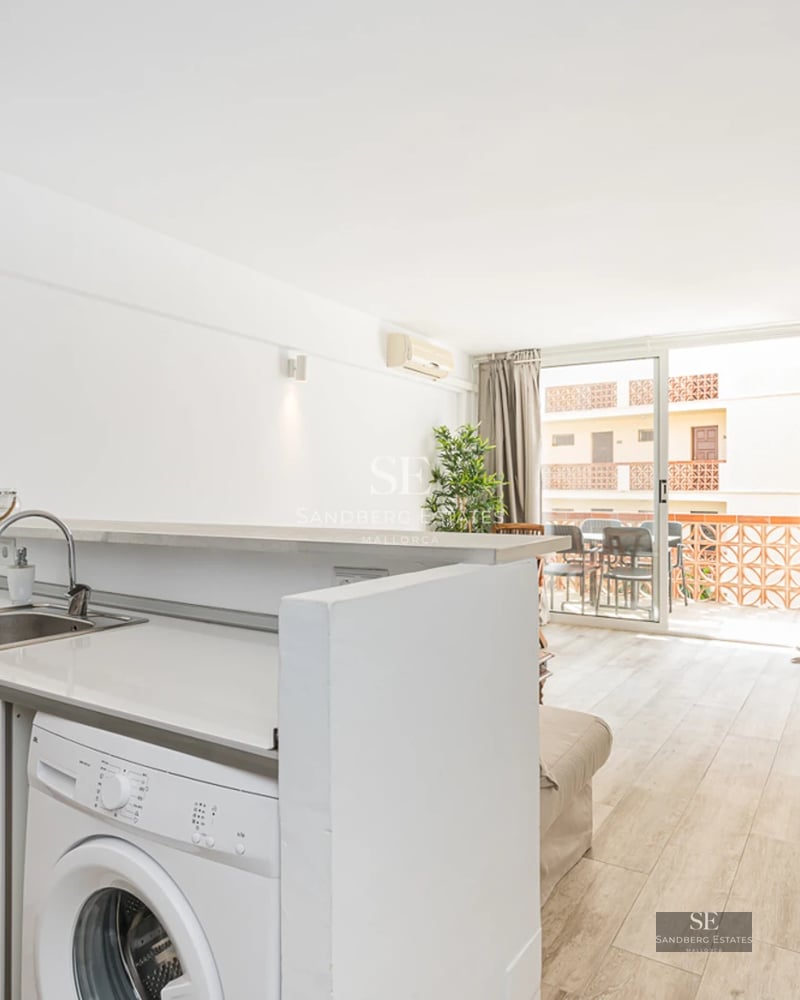 Exterior of a modern villa featuring a pool, large windows, minimalist landscaping, and an elegant terrace. Soft ambient lighting.