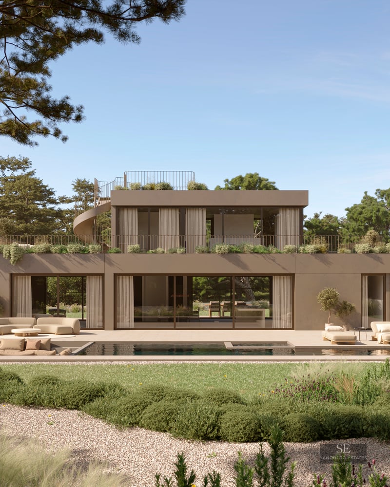 Modern two-story villa with a large rectangular swimming pool, outdoor lounge area, and lush green landscaping.