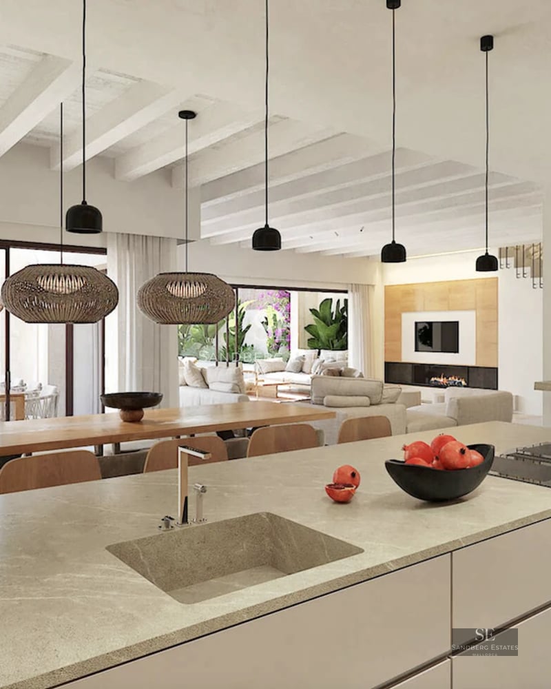 Spacious balcony with panoramic sea views. Modern, elegant furniture. Transparent glass railing.