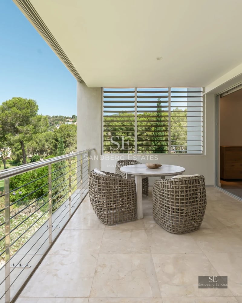 Exterior of modern villa with infinity pool. Minimalist architecture, clean lines, expansive terraces, and lush garden.