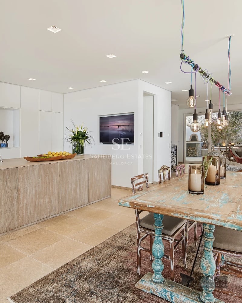 Exterior view of a modern villa with a pool, large windows, and lush gardens. Contemporary architecture.