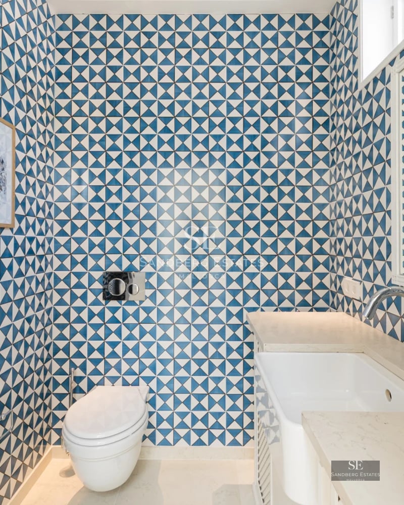 Spacious terrace featuring an infinity pool and panoramic sea views. Modern design with elegant furniture and landscaping details.