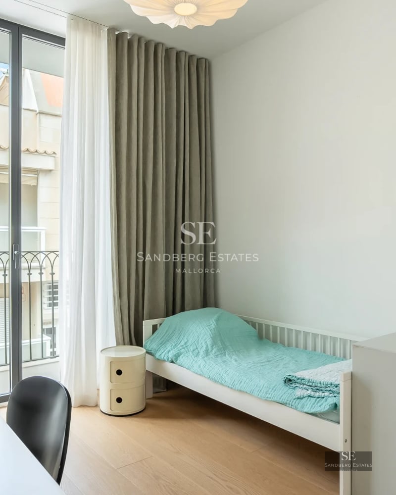 Spacious terrace with infinity pool and panoramic views. Modern design with elegant furniture and lush gardens.