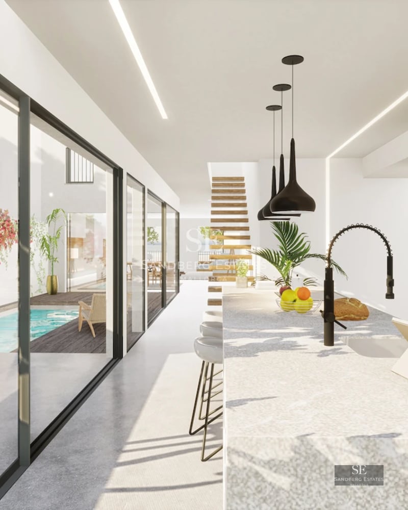 Spacious terrace with infinity pool, sun loungers, and panoramic sea views. Modern, elegant design with high-end outdoor furniture.