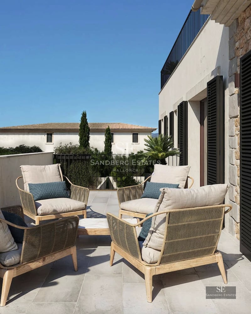 Aerial view of a modern villa with turquoise pool, surrounded by lush gardens and minimalist architecture. Natural lighting.