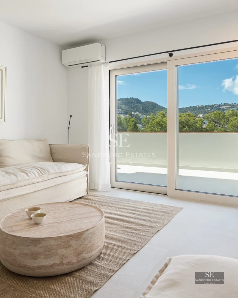 Exterior view of modern villa with pool and lush garden. Minimalist architecture with large windows and clean lines.