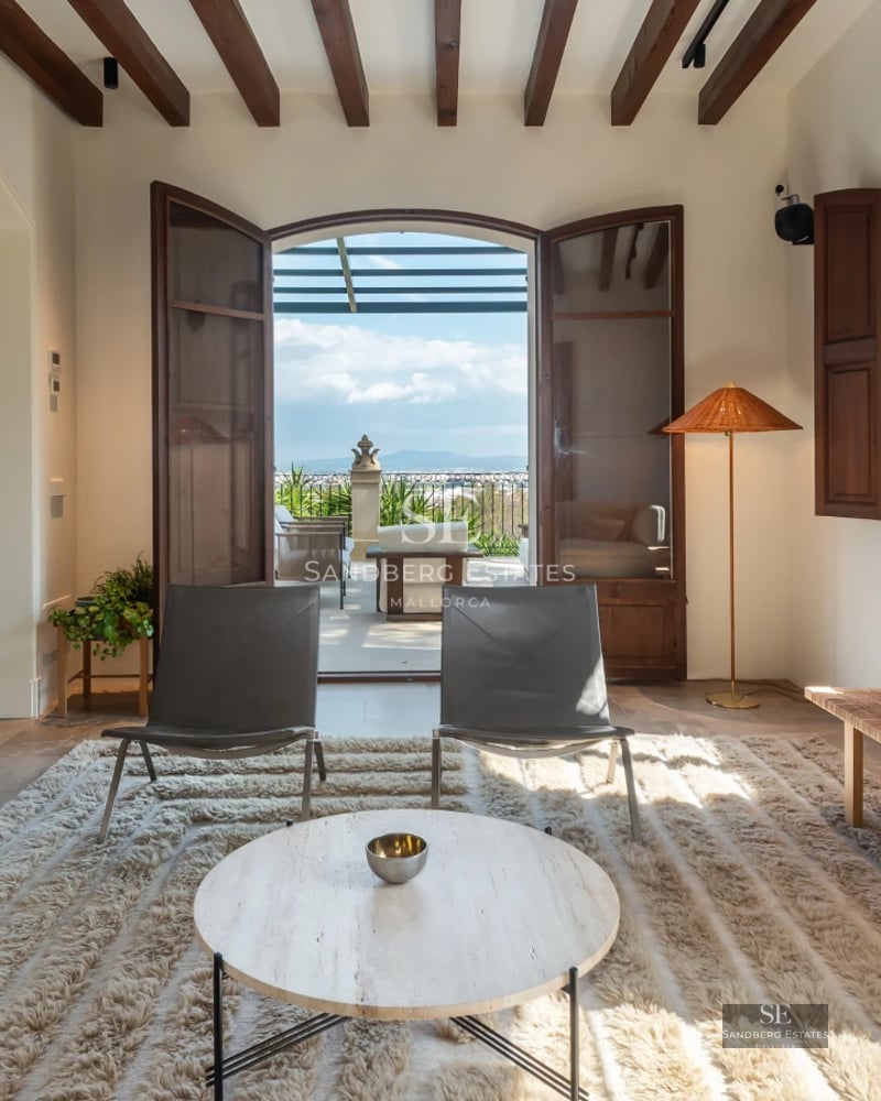 Exterior of modern villa with pool, garden, and spacious terraces. Elegant design and high-quality finishes.