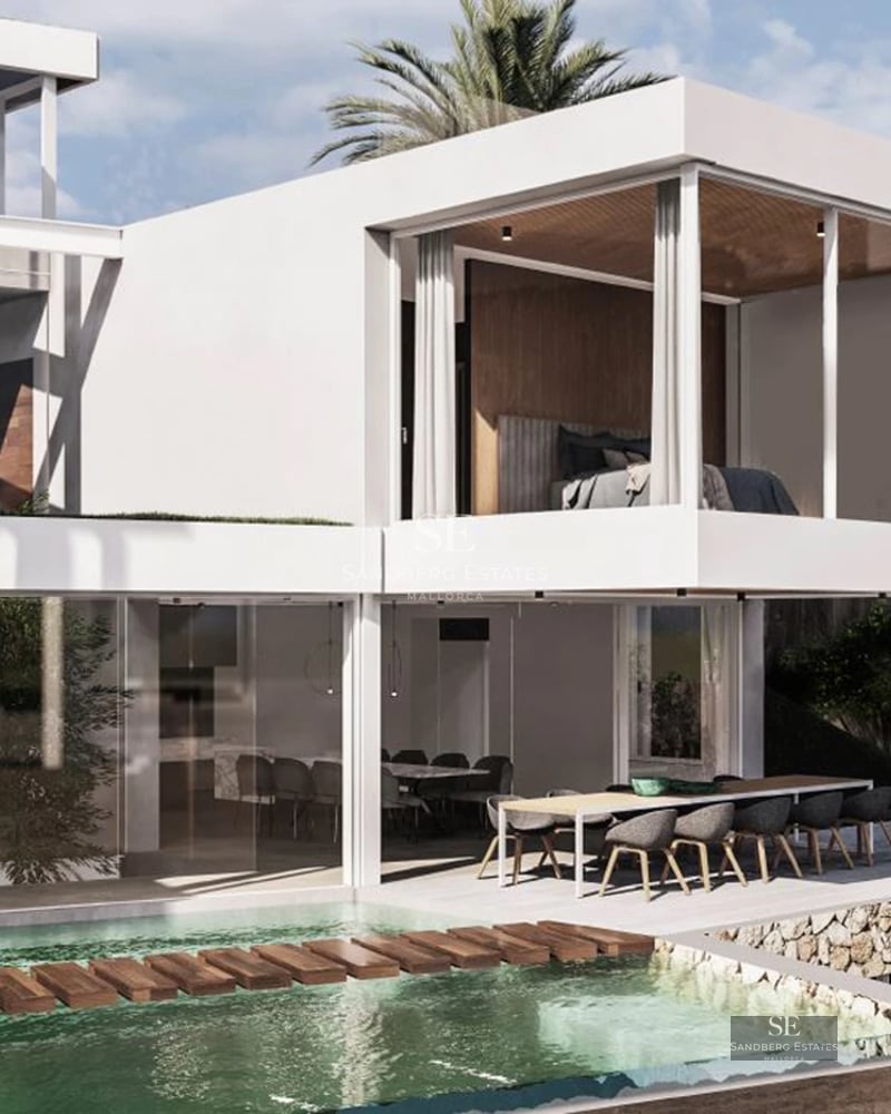 View of a modern villa with infinity pool, manicured lawn and minimalist architecture. Warm ambient lighting.