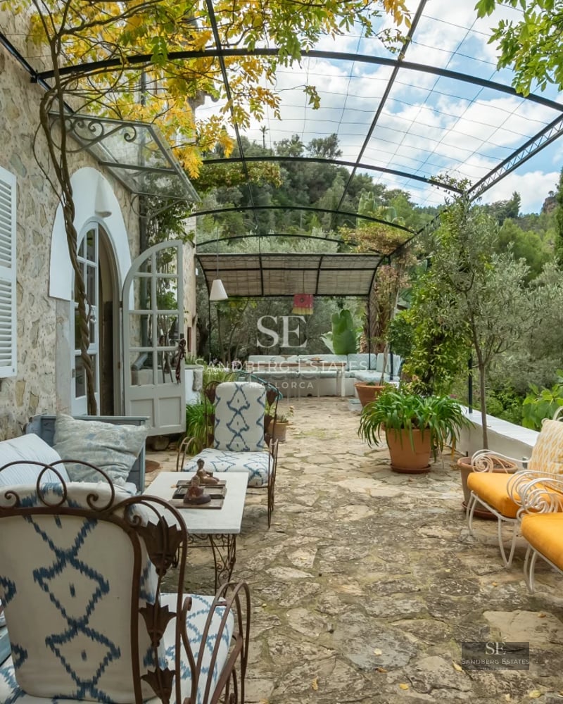 Exterior view of a modern villa with a pool. Minimalist design, large terraces, and lush garden. Ideal for investment.