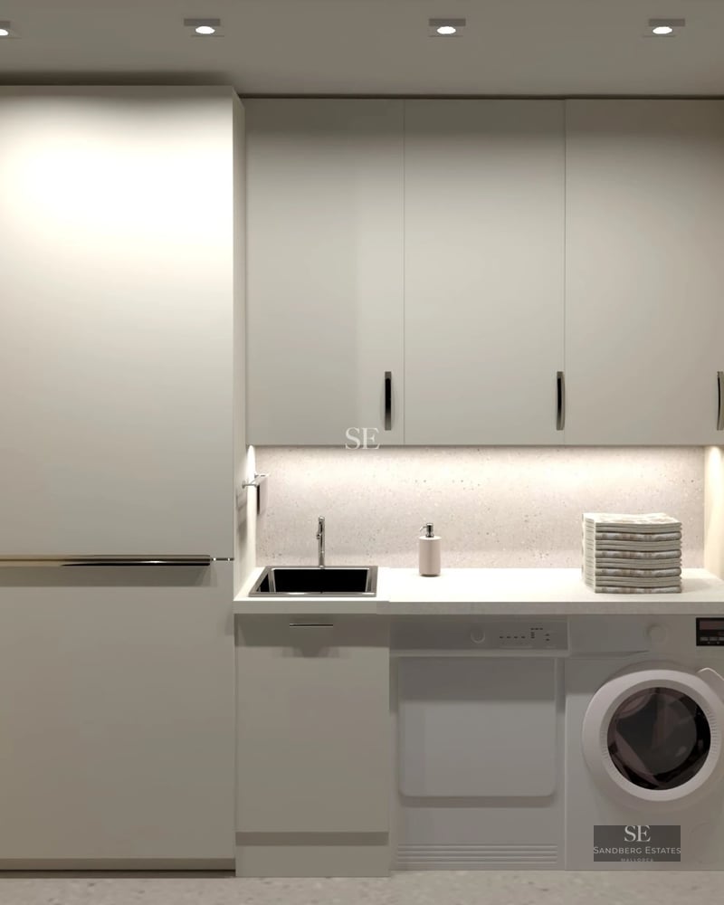 Spacious terrace with panoramic sea views. Modern design with wooden floors and elegant furniture for enjoying the outdoors.