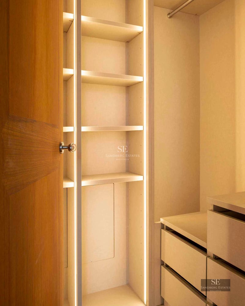 Spacious balcony with panoramic sea views. Modern design, glass railing, and elegant furniture. Ideal for relaxing and enjoying the scenery.