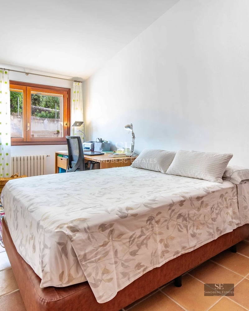 Spacious balcony with sea views. Modern design featuring glass railing and elegant furniture. Bright and welcoming outdoor space.