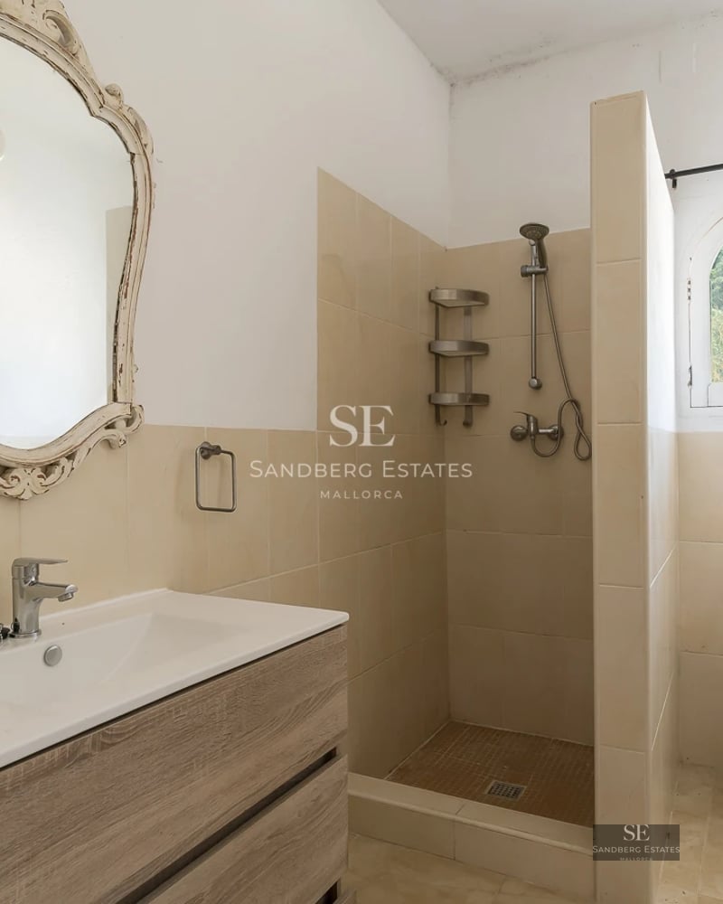 Panoramic view of modern villa with infinity pool, surrounded by greenery. Minimalist architecture with large glass windows and spacious terrace.