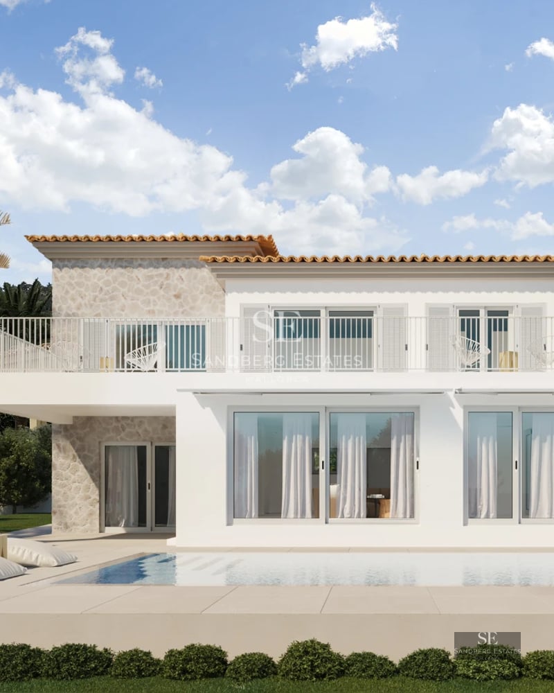 Spacious living room with large windows, light wood floor, modern fireplace and views of a lush garden. Minimalist design.