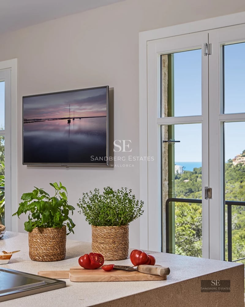 Spacious exterior with pool, sun loungers, and landscaped area. Modern and relaxing design for enjoying the outdoors.