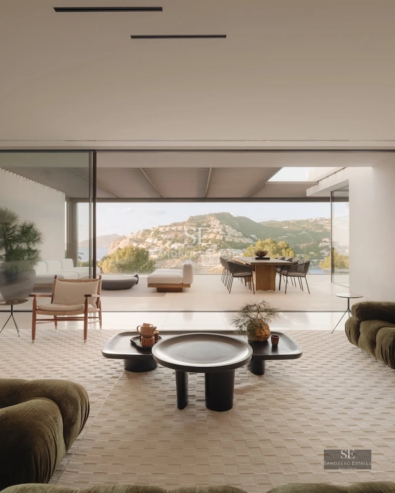 Exterior view of a modern villa with swimming pool and garden. Minimalist design, soft lighting, and high-quality finishes.