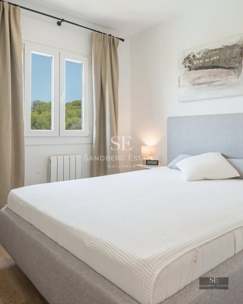 Modern exterior with pool, garden, and large windows. Minimalist design with clean lines and abundant natural light.