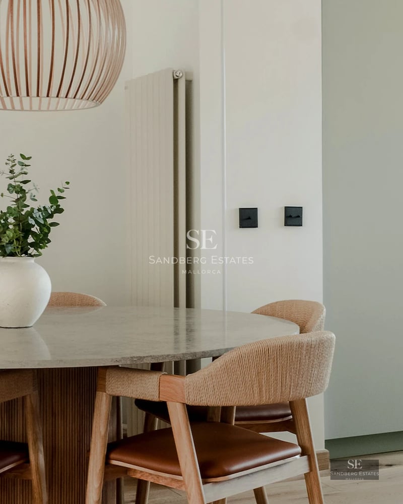 Modern villa featuring an infinity pool, large windows, lush gardens, and minimalist design. Panoramic sea views.