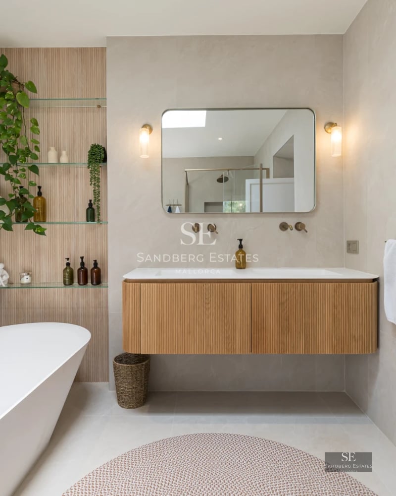 Image of villa with infinity pool, sun loungers, sea views. Modern architecture, clean lines, and high-end finishes.