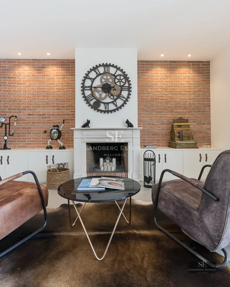 Exterior view of a modern villa with pool, lush garden and large window illuminating the interior. Minimalist design with luxurious finishes.