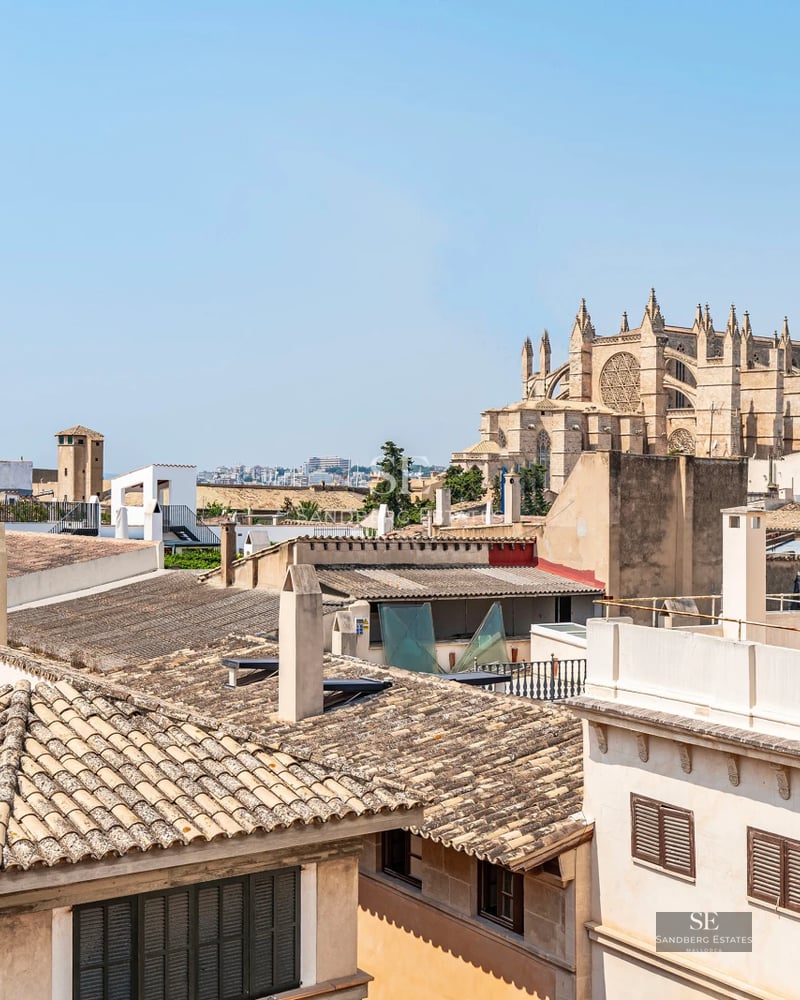 Exterior view of a modern villa featuring a pool, manicured garden, and expansive living spaces. Contemporary architecture and sleek design.