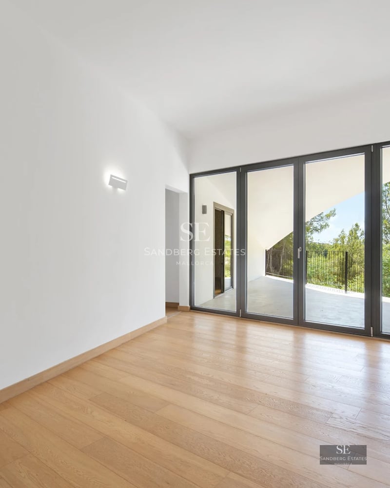 View of a modern villa with infinity pool. Minimalist design, abundant natural light, neutral colors, and luxury furnishings.