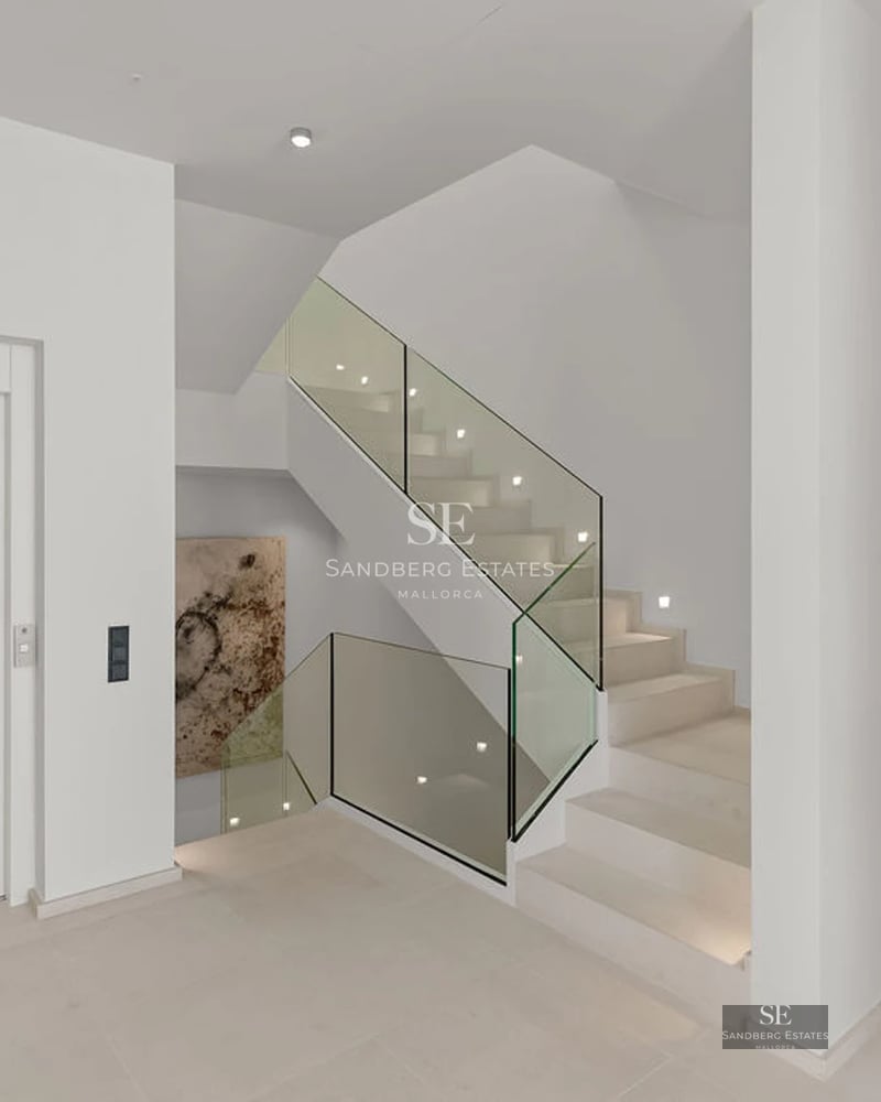 Exterior view of a modern villa with pool, surrounded by lush vegetation. Minimalist and elegant architectural design.