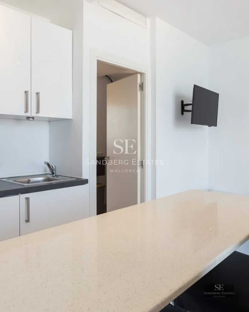 Exterior view of a modern villa with a pool, manicured garden, and spacious outdoor living areas. Minimalist design with high-quality finishes.