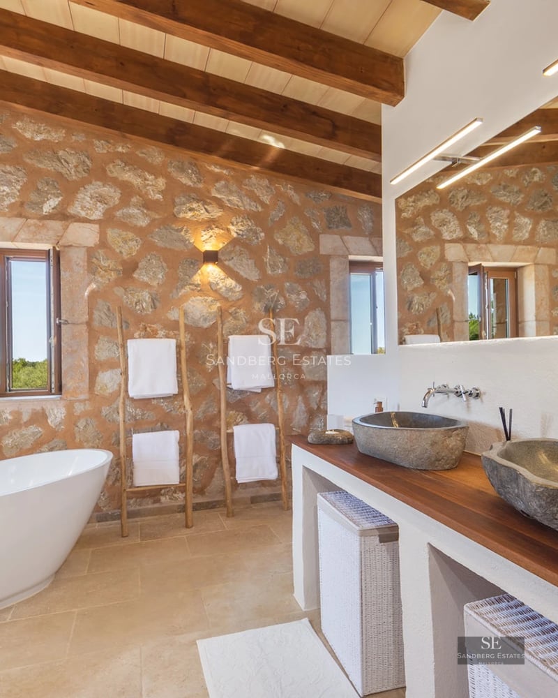 Expansive terrace with infinity pool and sea views. Modern design with elegant furniture and lush vegetation.