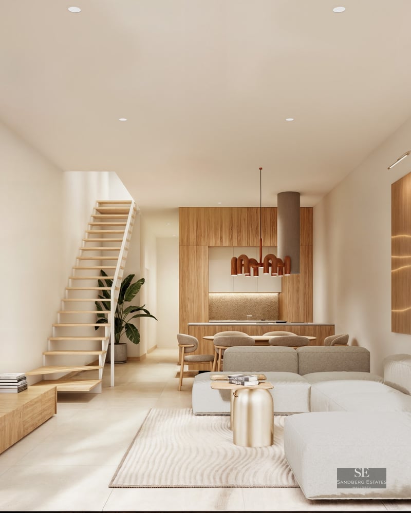 Modern living room with a large modular sofa, light wood staircase, and slatted wood wall panels in a bright interior.