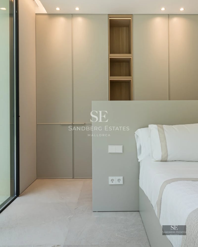 Exterior view of a modern villa with a pool, large garden, and elegant architecture. Minimalist design with large windows.