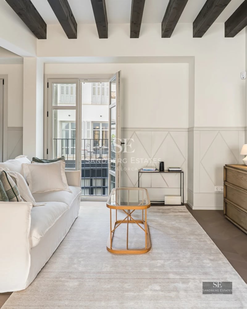 Exterior view of a modern villa with a pool, garden, and terrace. Minimalist design, high-quality finishes, and abundant natural light.