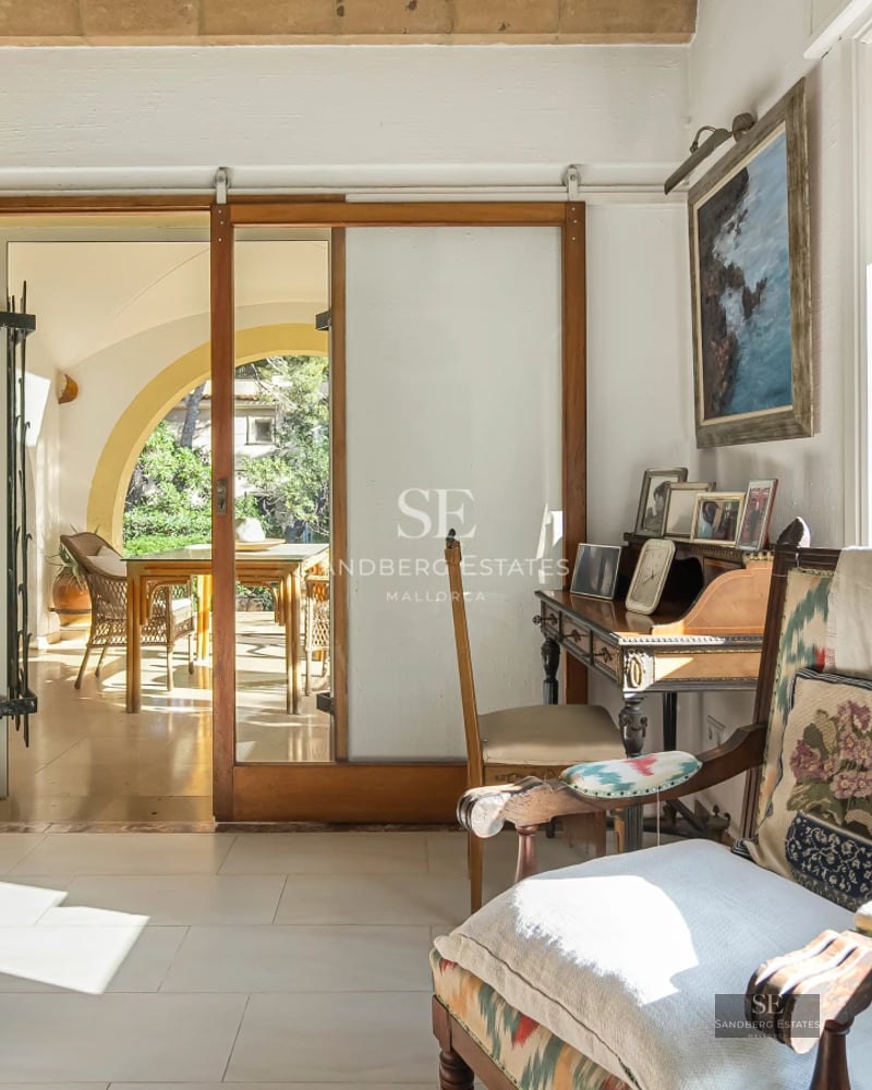 Exterior view of a modern villa with a pool, manicured garden, and spacious relaxation areas. Design architecture.