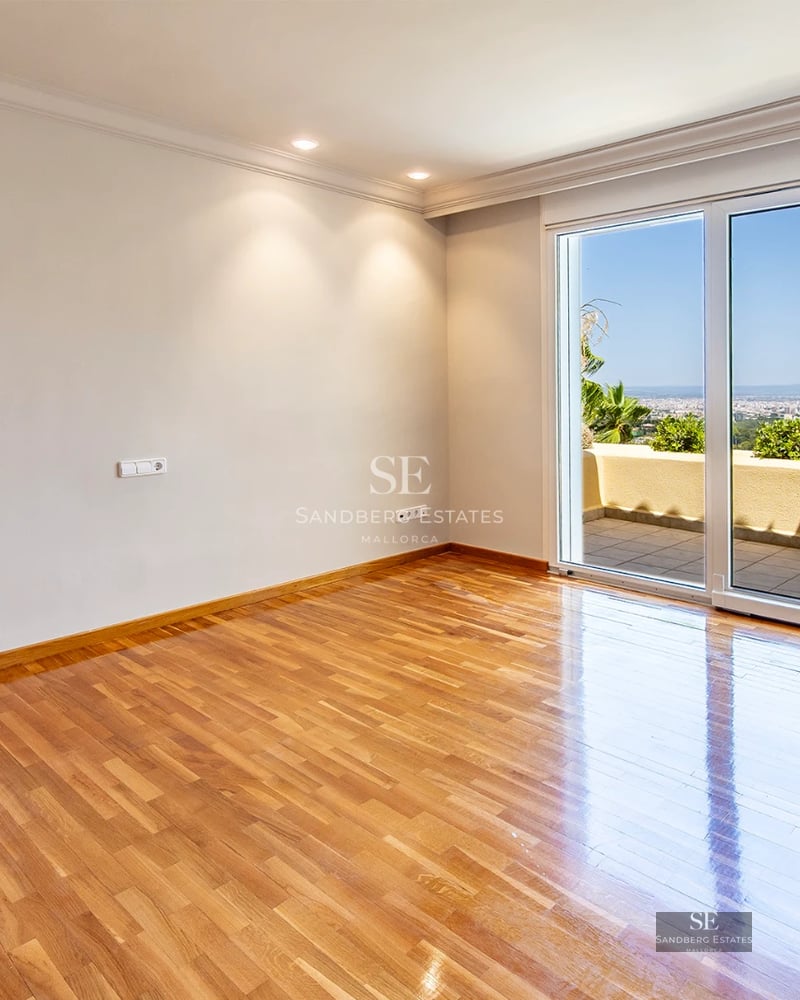Spacious terrace with infinity pool and panoramic views. Modern design with elegant furniture and lush gardens.