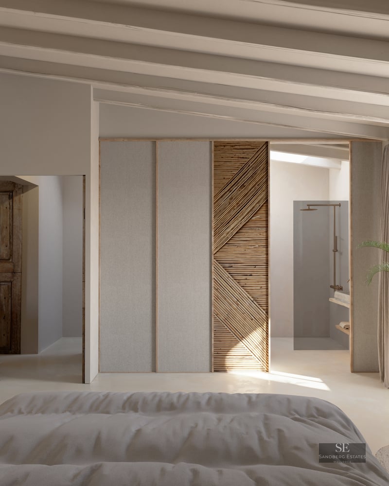 Luxury master bedroom with exposed beams, natural wood textures, and an integrated open-concept ensuite bathroom.