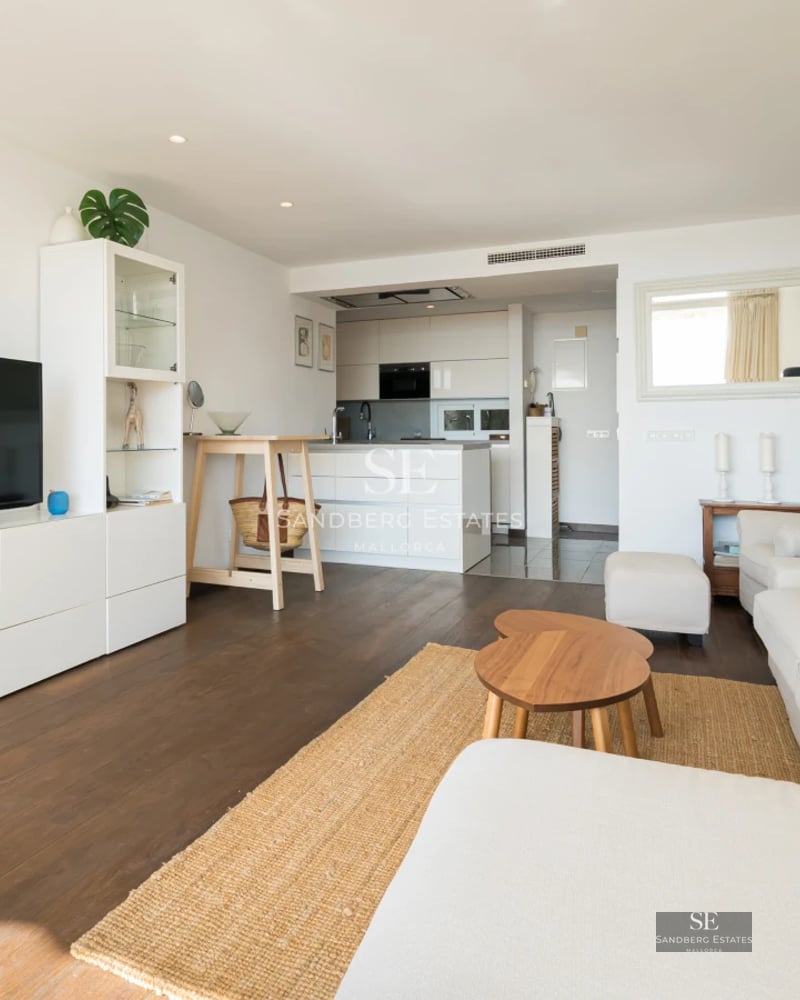 Exterior view of a modern villa with pool, surrounded by greenery. Minimalist architecture, large windows, and luxury finishes.