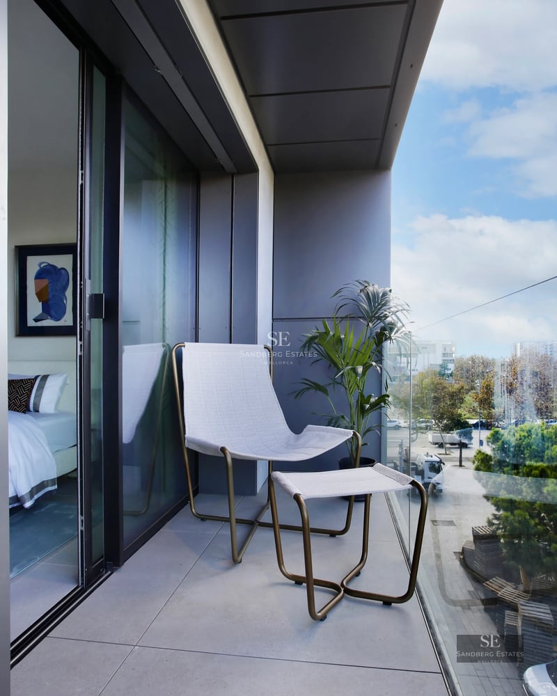 Pool view of modern villa featuring expansive windows, lush landscaping, and minimalist architectural design. Ambient lighting.