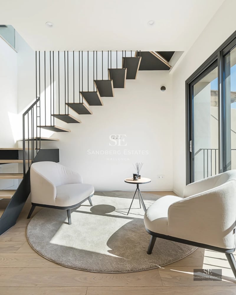 Expansive terrace featuring an infinity pool and panoramic views. Modern design, elegant furnishings, and lush greenery.