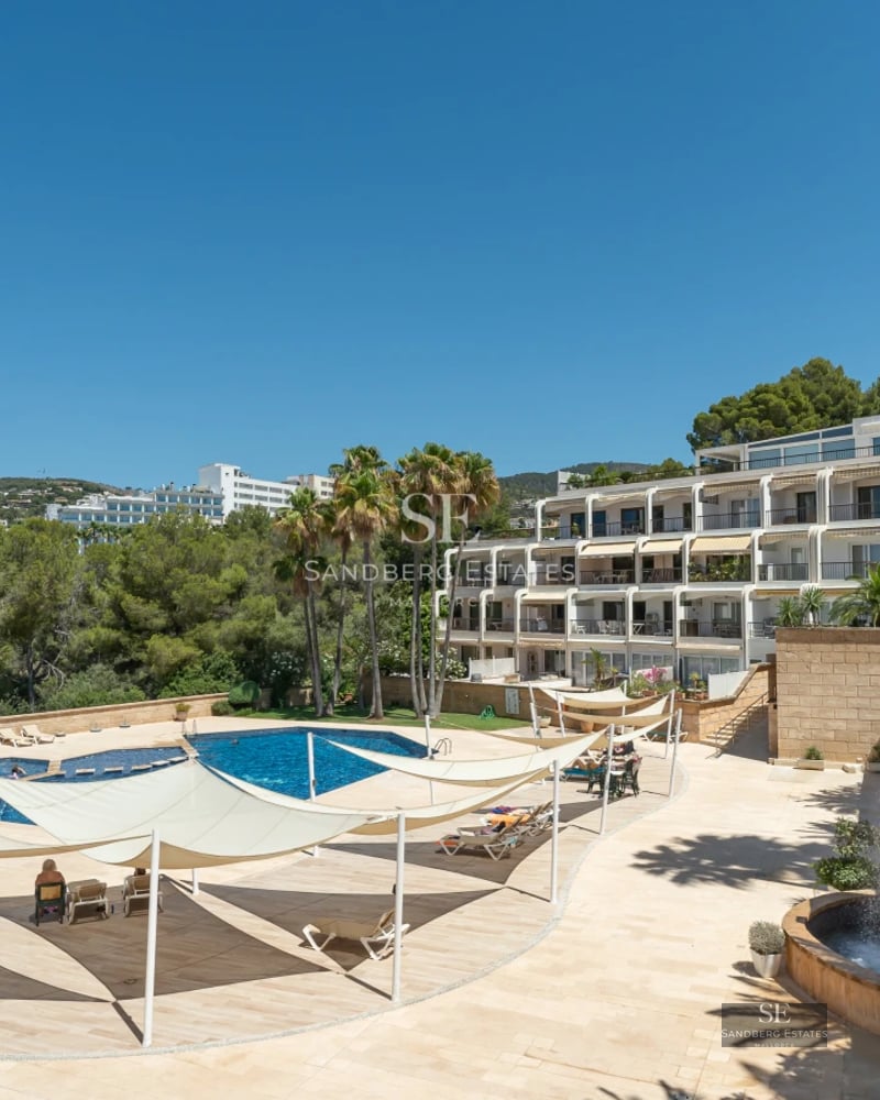 Exterior of a modern villa with infinity pool, spacious terraces, and panoramic views. Minimalist design with clean lines and high-end materials.