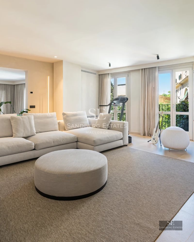 Pool view, modern villa with sleek design. Palm trees, lawn, and outdoor furniture. Ambient lighting and manicured landscaping.