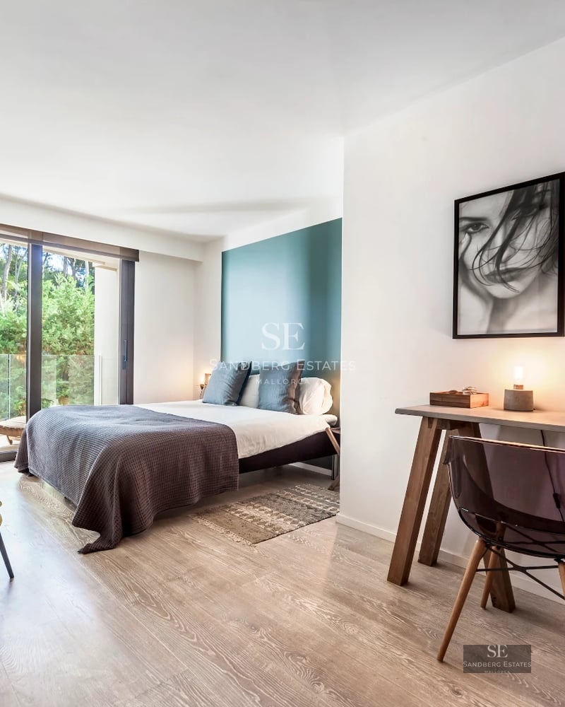 Exterior view of modern villa with infinity pool, lush garden, and minimalist architectural design. Large terraces and window fronts.