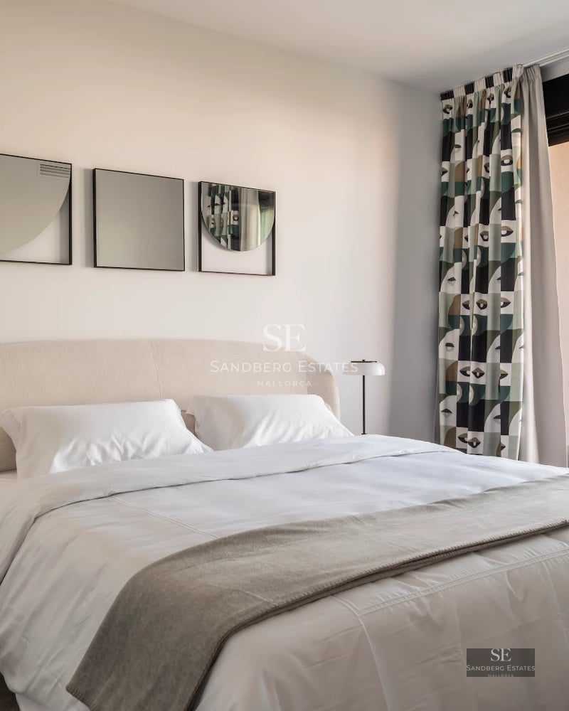 Exterior view of a modern villa featuring an infinity pool, lush garden, and spacious terraces. Minimalist design with large windows.