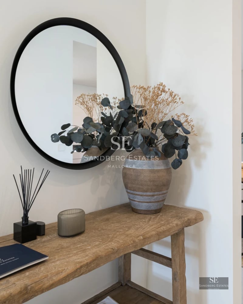 Exterior view of modern villa with infinity pool, expansive terraces, and lush garden. Minimalist architecture and landscaping design.