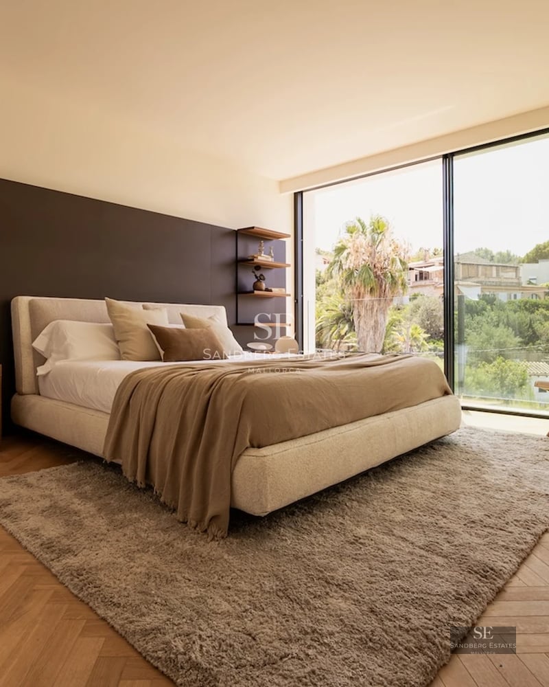 Exterior view of a modern villa with a pool. Minimalist architecture, large windows, garden, and abundant natural light.