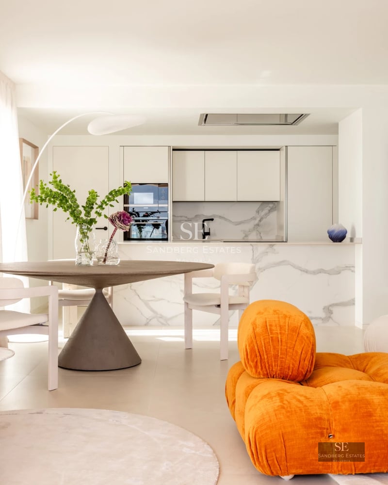 Pool and terrace view of modern villa. Clean architecture, infinity pool, ample outdoor space. Luxury and comfort.